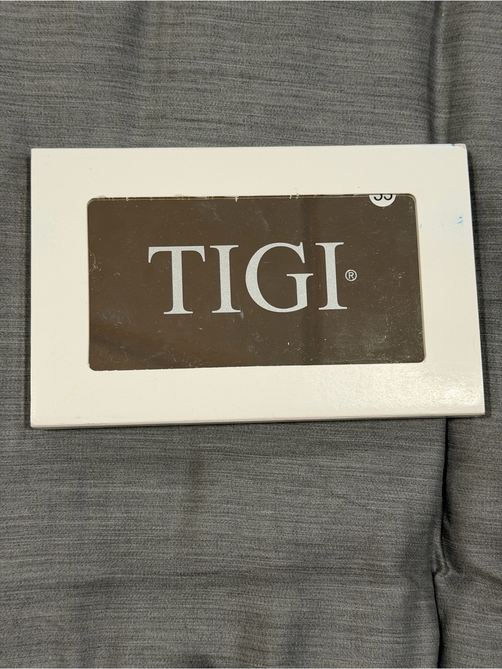 TIGI Compact Eyeshadow Palette in White and Brown Window